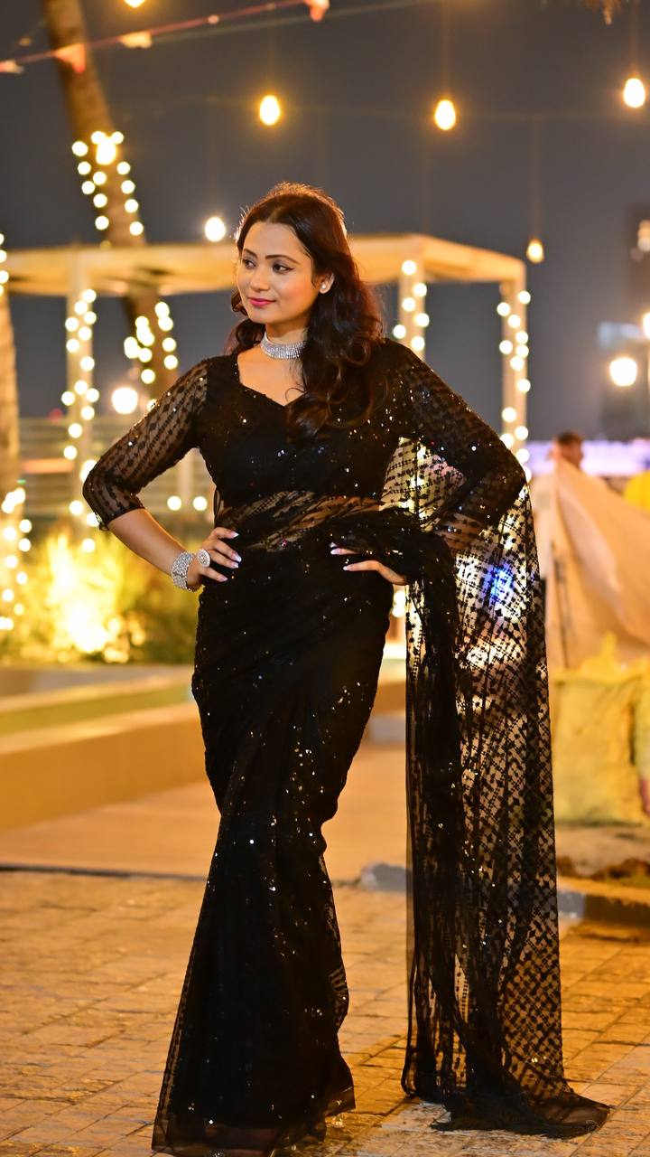 Net with heavy sequins and thread work Black Saree